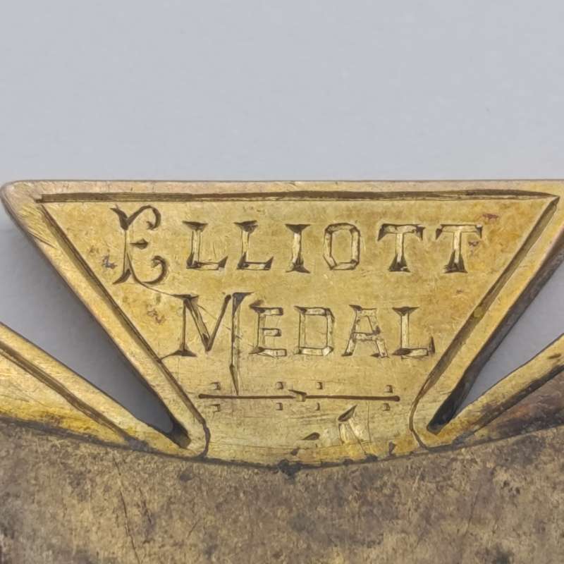 Brooch with Gold inscribed Elliott medal to J. Arnold "CAS 1895"