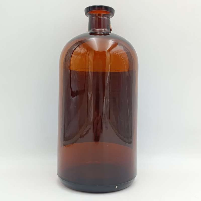 Antique Polak and Schwarz Lemon Sublime Essence casted glass bottle with label