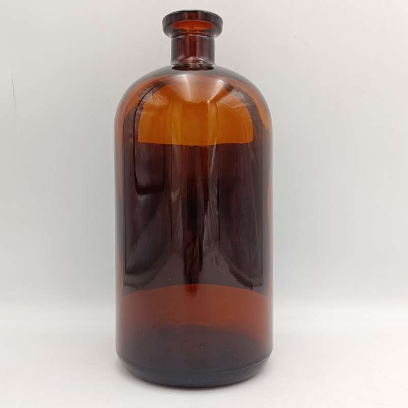 Antique Polak and Schwarz Vanilol casted glass bottle with label