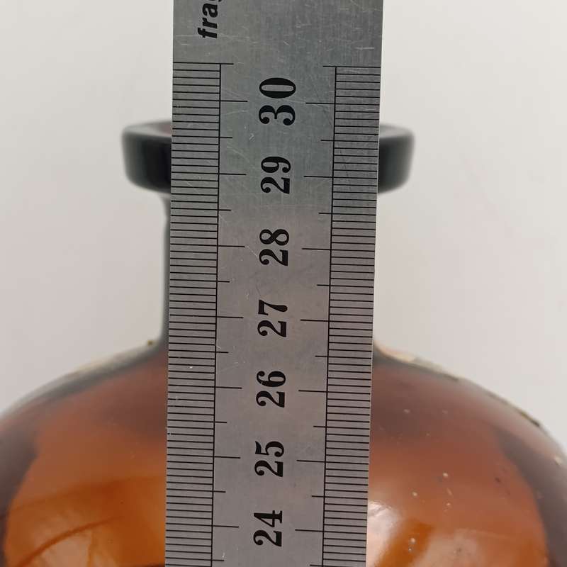 Antique Polak and Schwarz Vanilol casted glass bottle with label