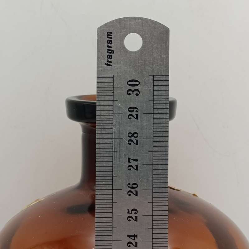Antique Polak Schwarz Walnut Oil casted glass bottle with label