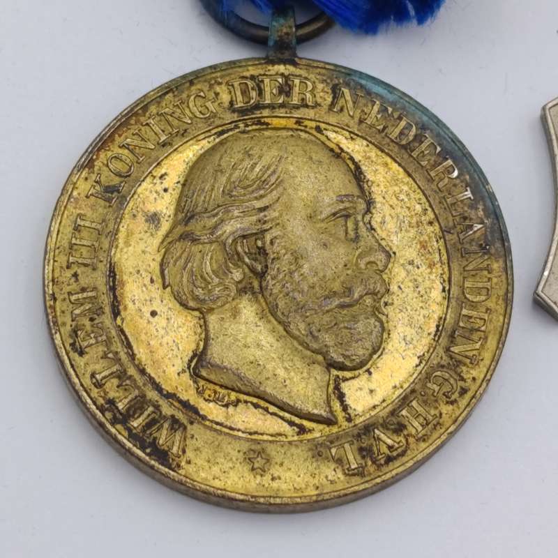 Set of 3 Dutch Aceh War medals that belonged to a soldier who served in the Aceh War
