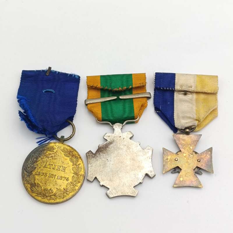 Set of 3 Dutch Aceh War medals that belonged to a soldier who served in the Aceh War