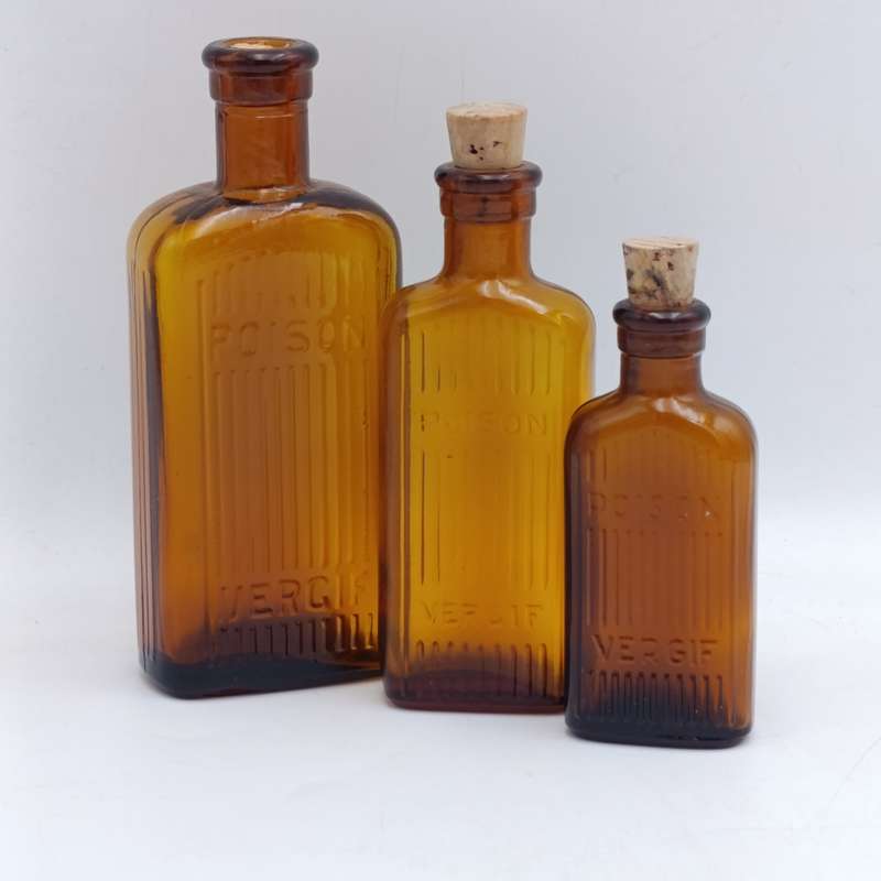 Lot of 3 sizes brown poison bottles - English and Afrikaans
