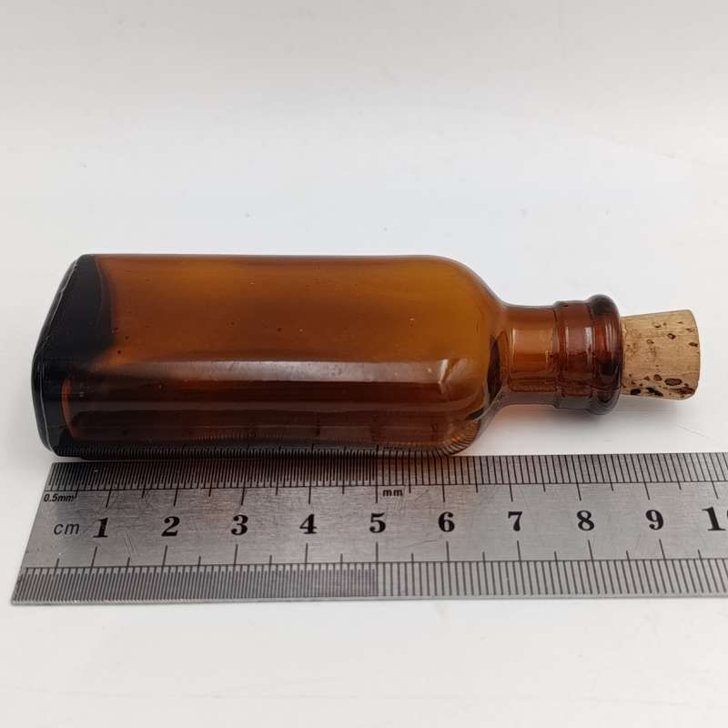 Lot of 3 sizes brown poison bottles - English and Afrikaans