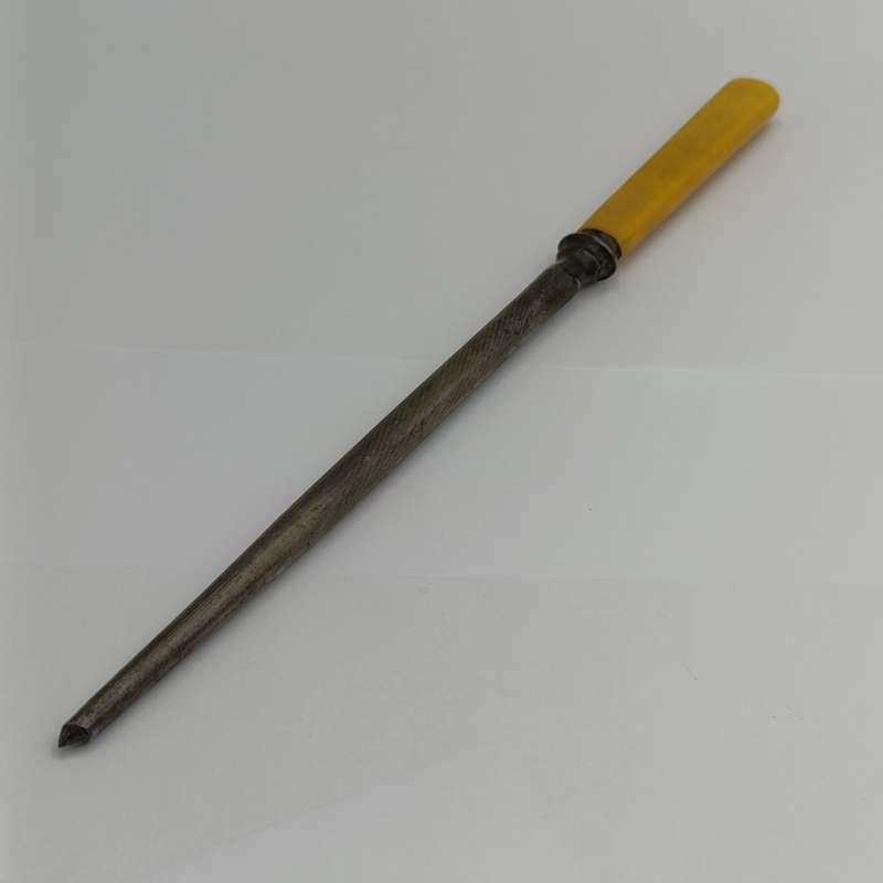 Vintage carving fork and sharpening stick with imitation bone handle