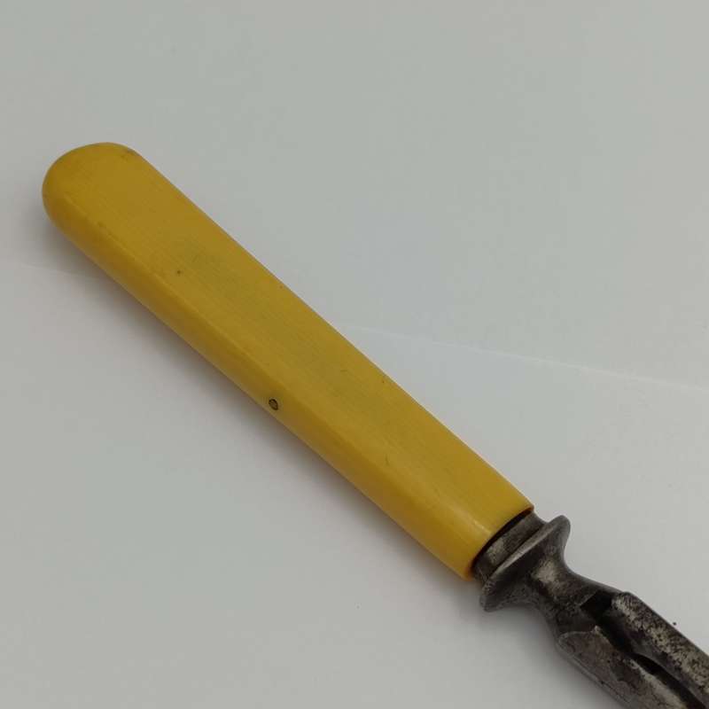 Vintage carving fork and sharpening stick with imitation bone handle