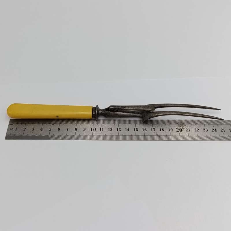 Vintage carving fork and sharpening stick with imitation bone handle