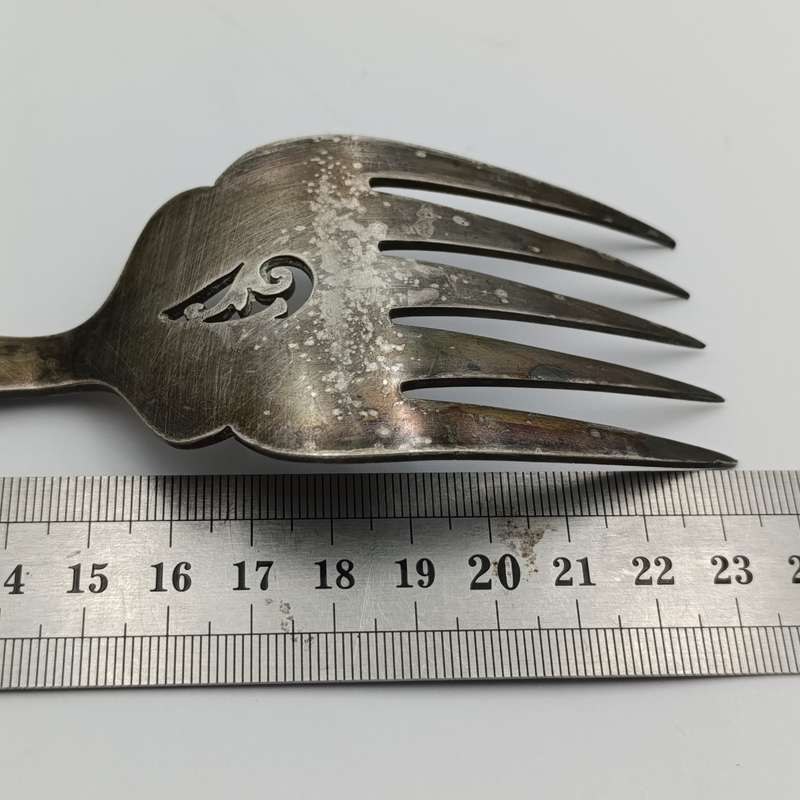 Antique fish serving set with silver trimming with imitation bone handles