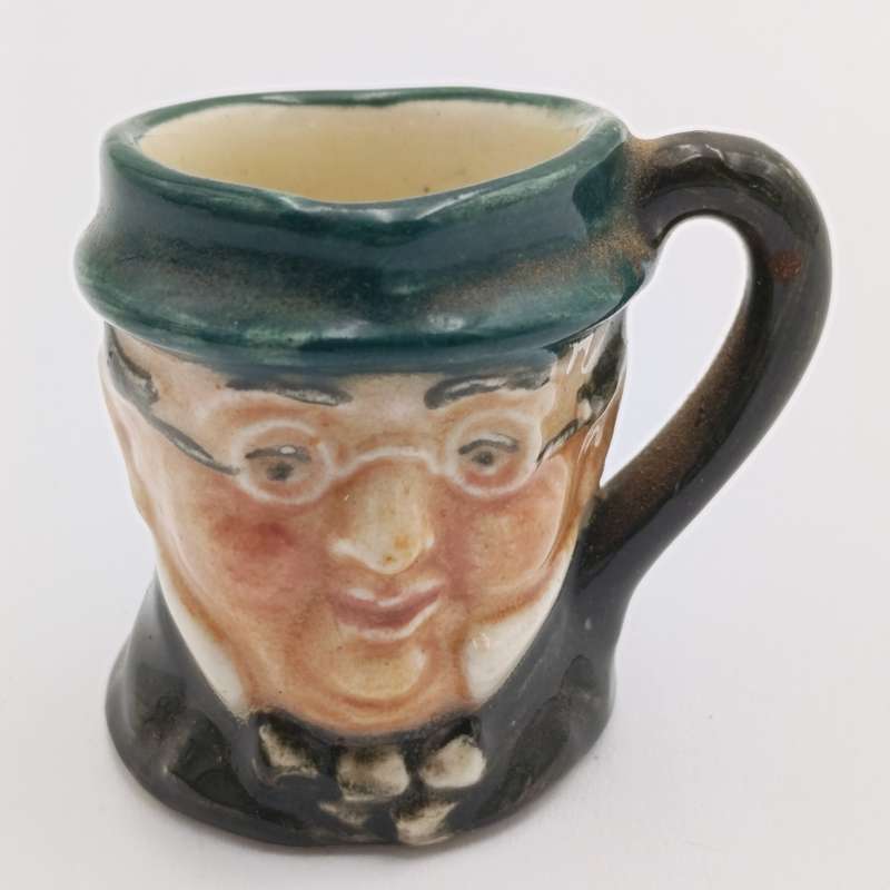 Miniature Royal Doulton toby jug