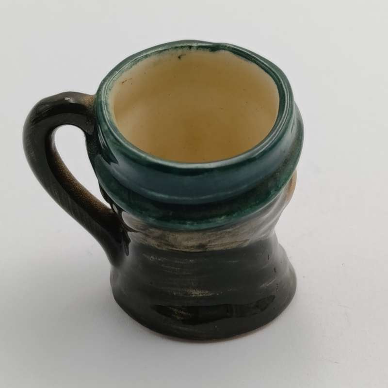 Miniature Royal Doulton toby jug