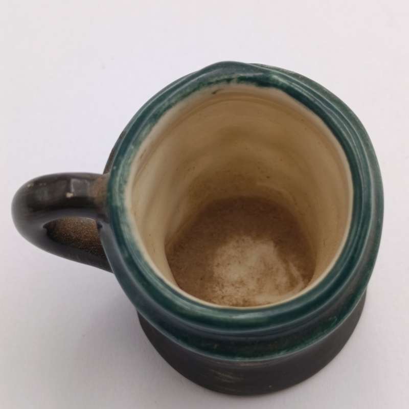 Miniature Royal Doulton toby jug