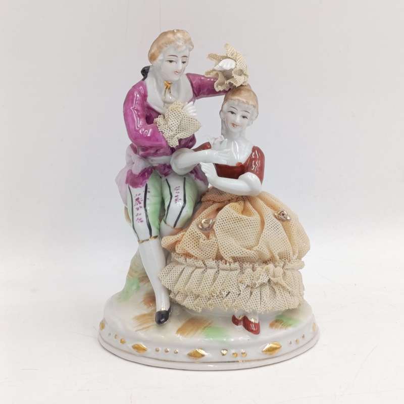 Vintage Louis XV style porcelain figurine