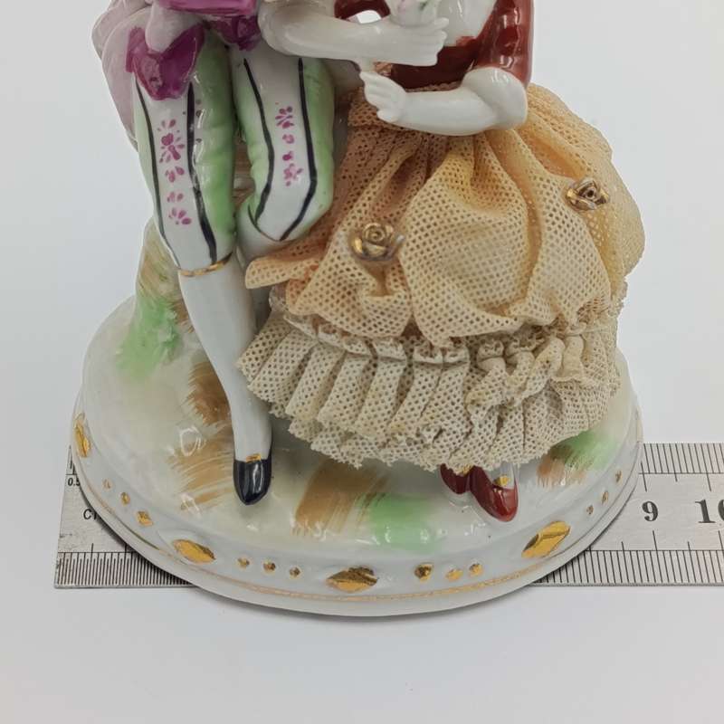Vintage Louis XV style porcelain figurine