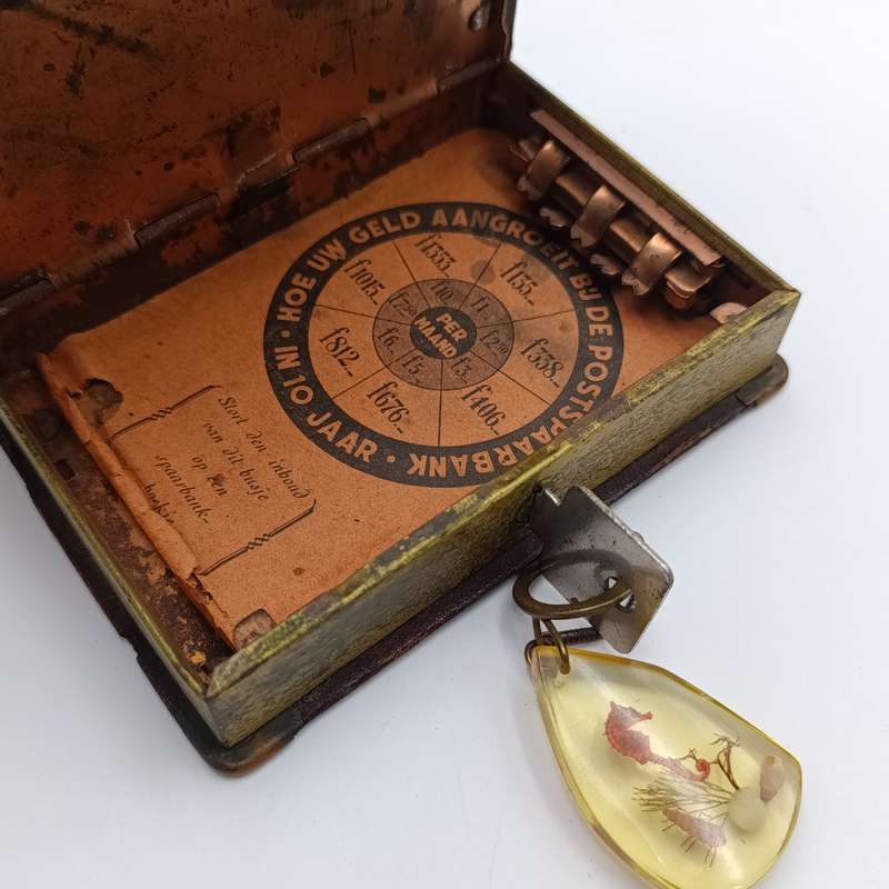 Vintage Nederlandsch-Indie postspaarbank book shaped money box with key