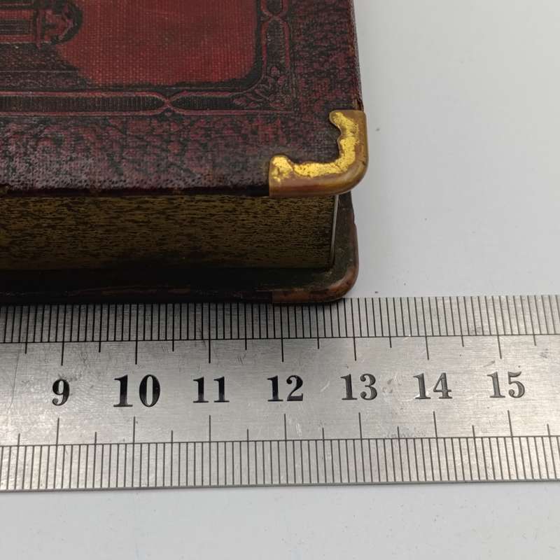 Vintage Nederlandsch-Indie postspaarbank book shaped money box with key