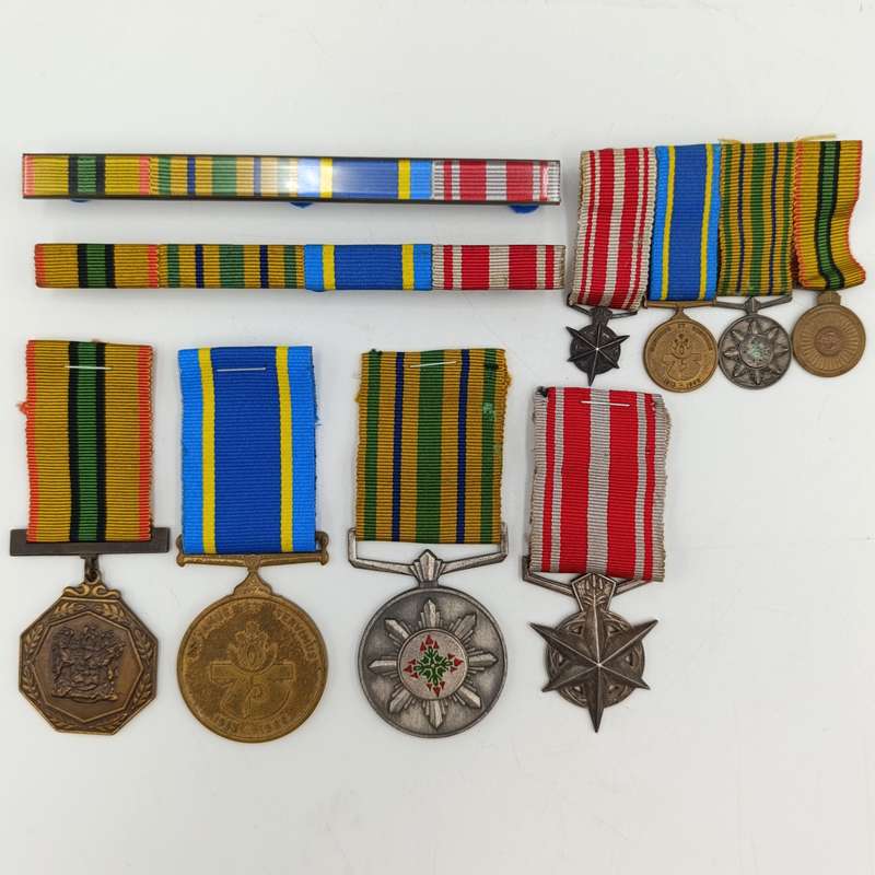 Set of 4 Police and Railway Police medals issued to Captain JJ van der Merwe - plus miniature set