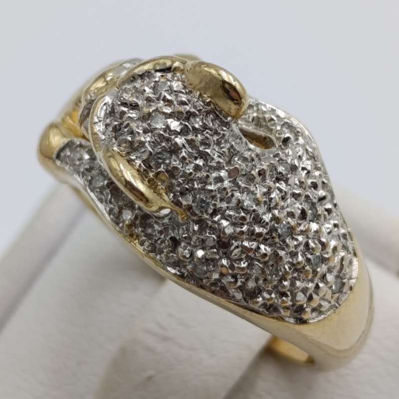 9kt gold predator with a multitude of small diamonds - weight 5.8g