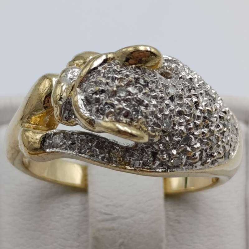 9kt gold predator with a multitude of small diamonds - weight 5.8g