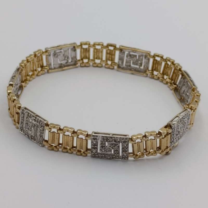Vintage 9kt gold bracelet with 56 diamonds and safety clip weight 10,5g