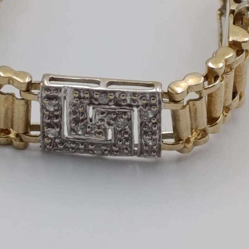 Vintage 9kt gold bracelet with 56 diamonds and safety clip weight 10,5g