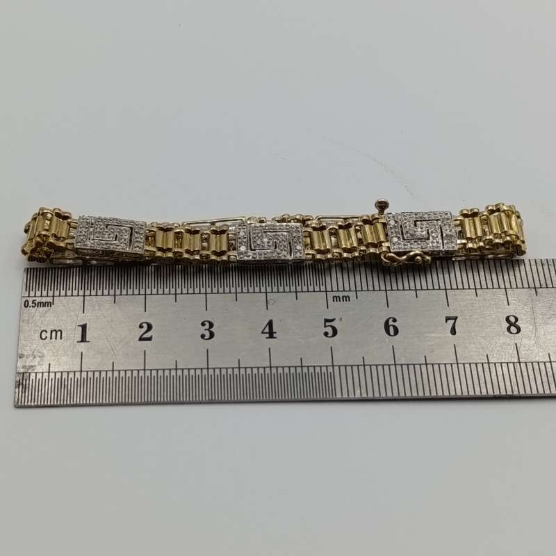 Vintage 9kt gold bracelet with 56 diamonds and safety clip weight 10,5g