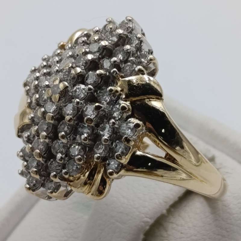 14kt gold ring with 57 diamonds weight 6.3g