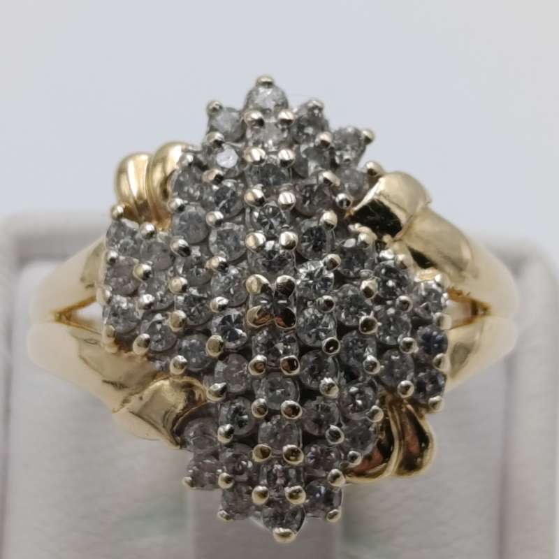 14kt gold ring with 57 diamonds weight 6.3g