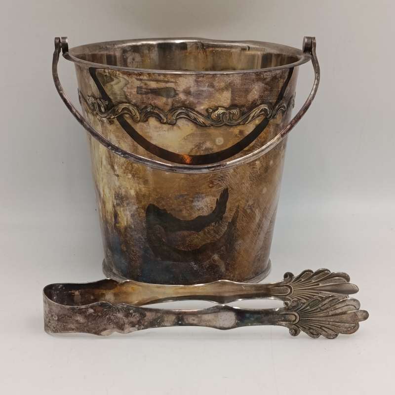 Vintage silverplated ice bucket with torgs