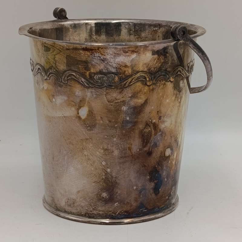 Vintage silverplated ice bucket with torgs
