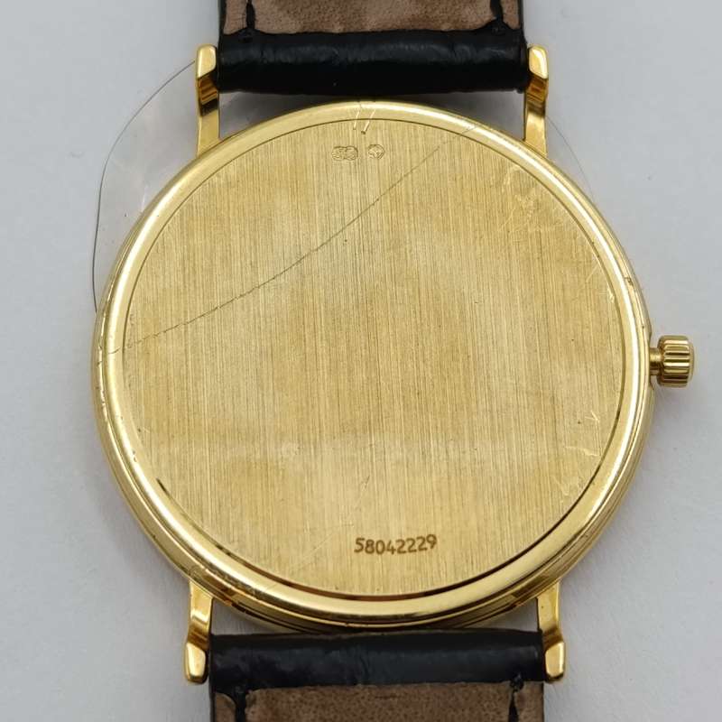 Omega 1530 Quartz 18kt gold men's watch - excellent condition in box with paperwork
