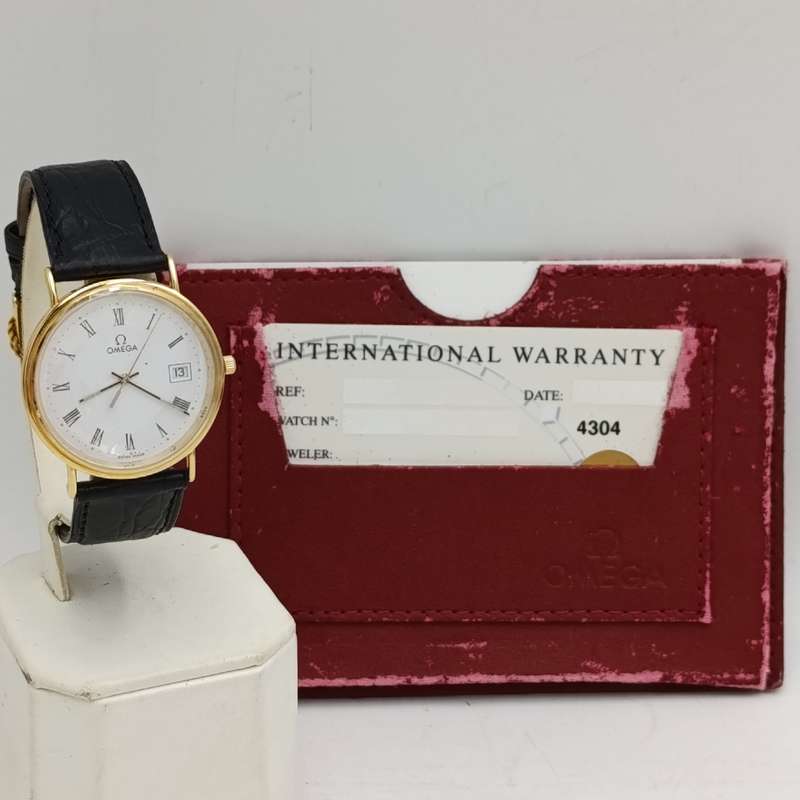 Omega 1530 Quartz 18kt gold men's watch - excellent condition in box with paperwork