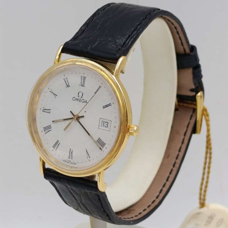 Omega 1530 Quartz 18kt gold men's watch - excellent condition in box with paperwork