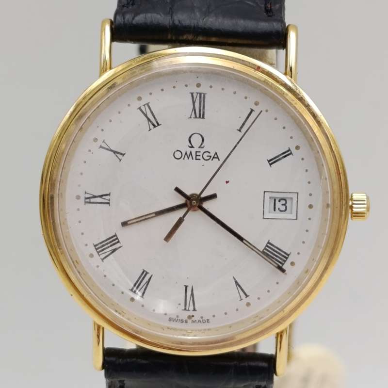 Omega 1530 Quartz 18kt gold men's watch - excellent condition in box with paperwork