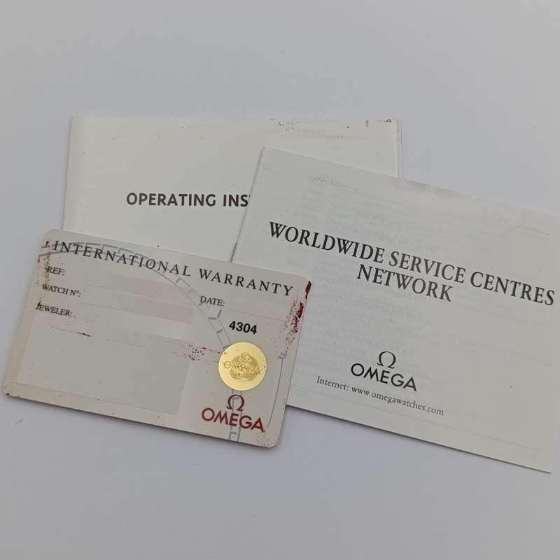 Omega 1530 Quartz 18kt gold men's watch - excellent condition in box with paperwork