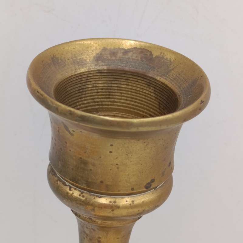 Two vintage brass candle holders