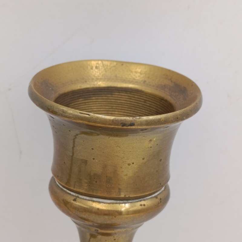 Two vintage brass candle holders