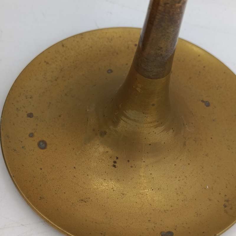 Two vintage brass candle holders