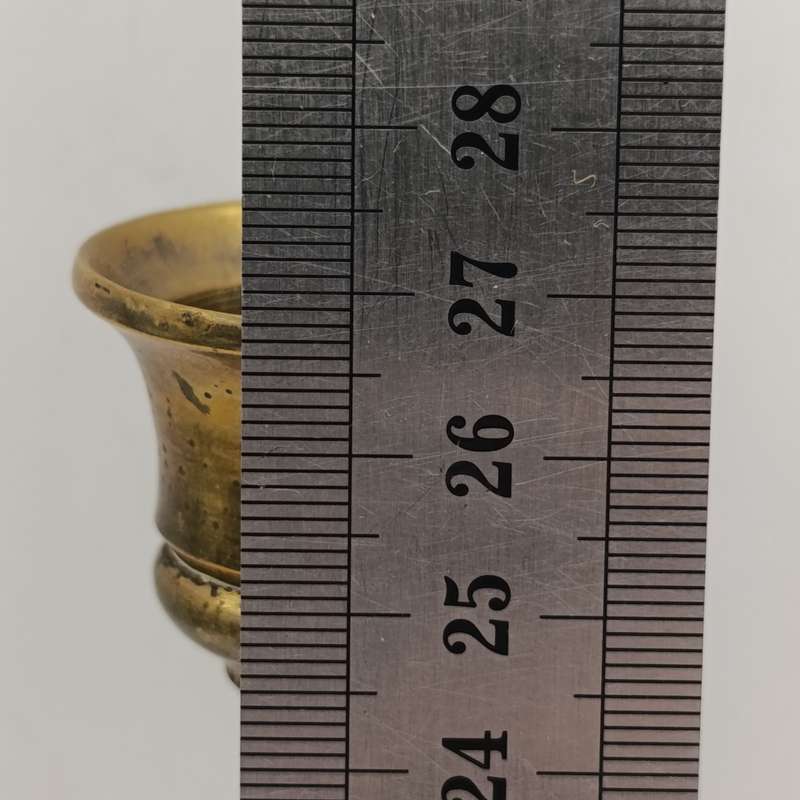 Two vintage brass candle holders