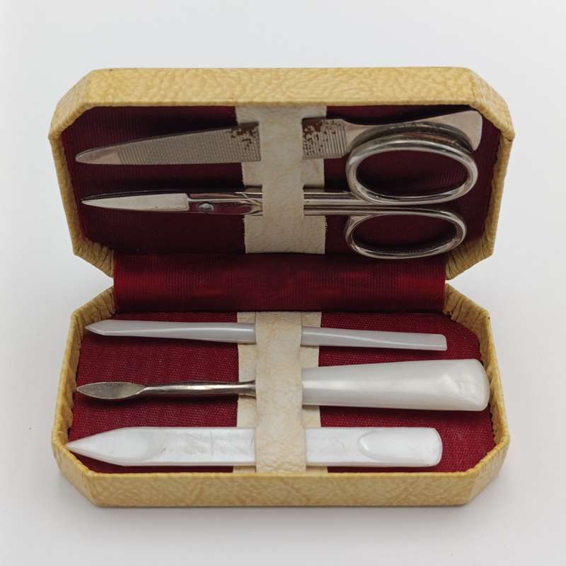 Vintage nail care kit in radio shaped case