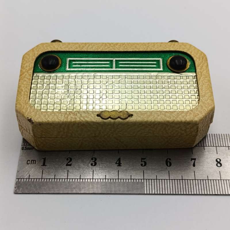 Vintage nail care kit in radio shaped case