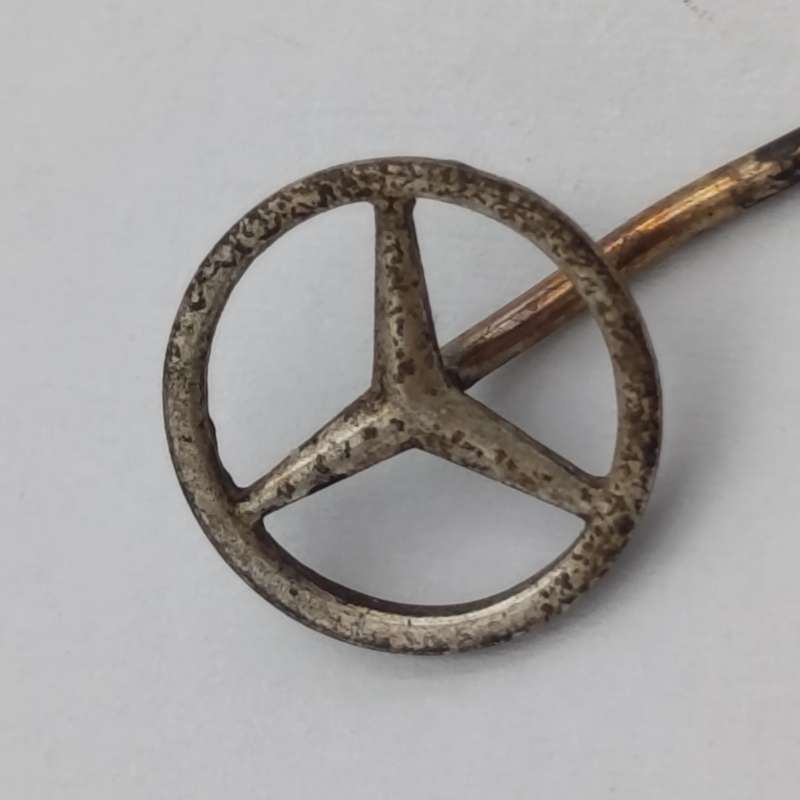 Vintage silver Mercedes-Benz stick pin badge