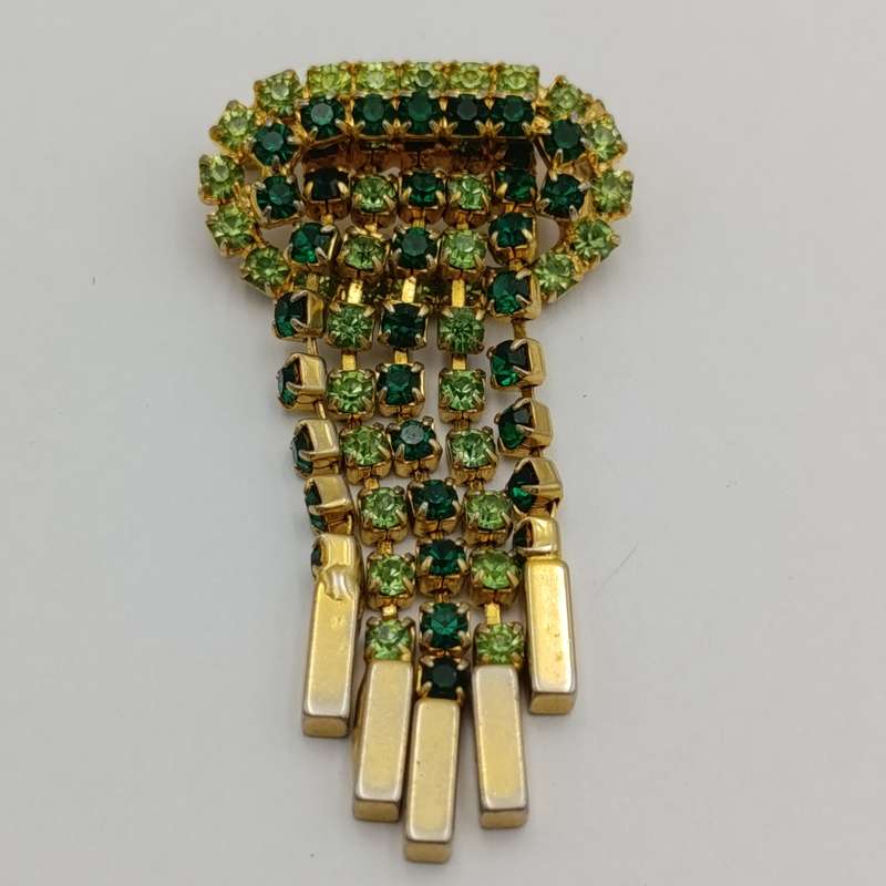 Vintage gold color & green stone brooch