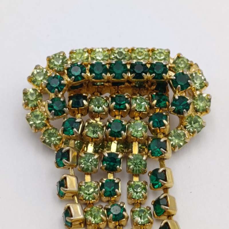 Vintage gold color & green stone brooch