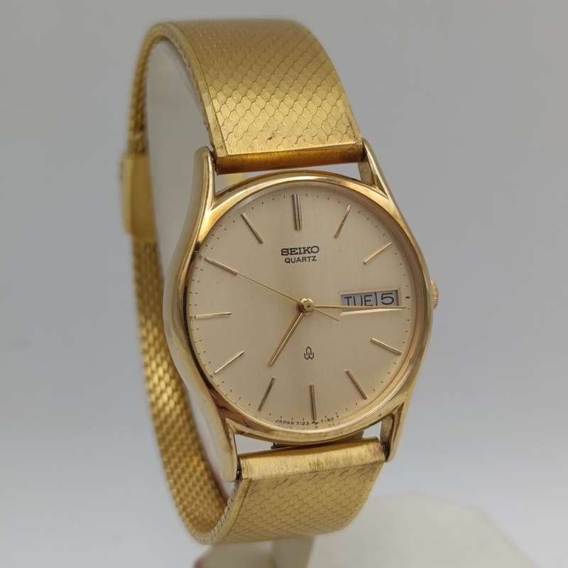 Vintage Seiko 7123-7090 Quartz gold colour men's watch with day/date - working
