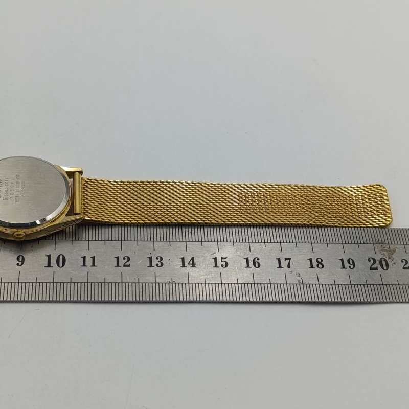 Vintage Seiko 7123-7090 Quartz gold colour men's watch with day/date - working