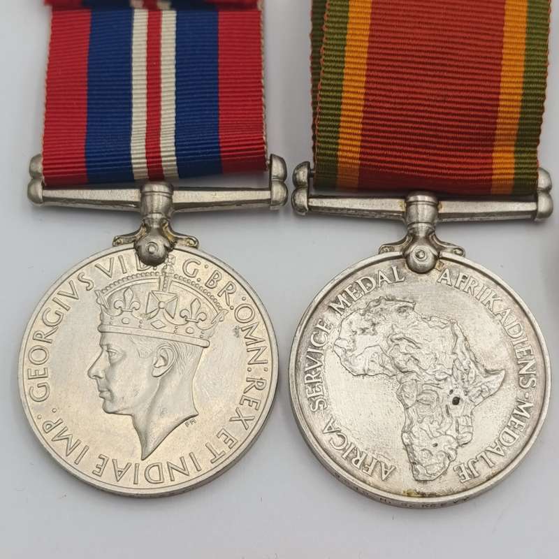 WW2 medals and badges set issued to 9549 HS Keevy - including 3 victory pin badges
