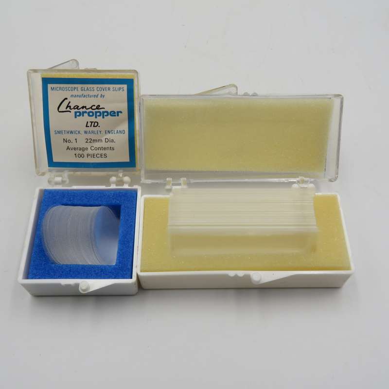 Lot of lab equipment including box of objective and deck glasses - also glass injection and bottle.