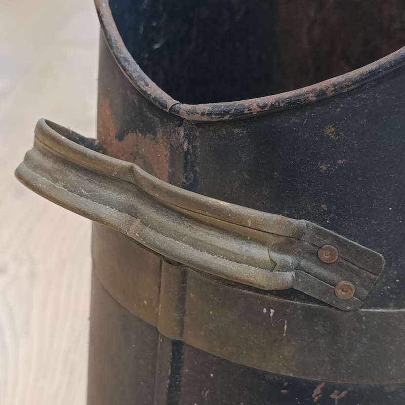 Antique metal coal scuttle with brass handles