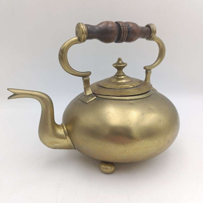 Beautiful vintage brass kettle with wooden handle
